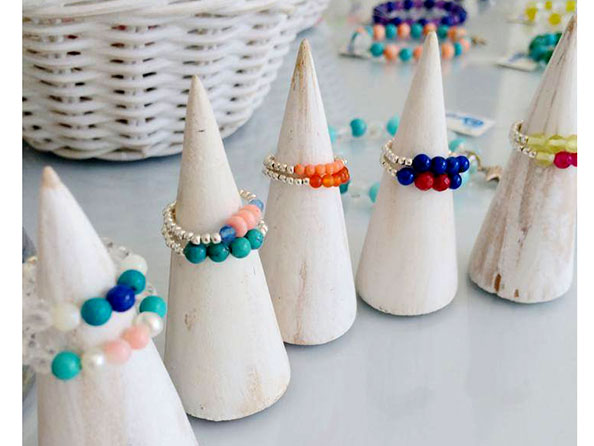 Ring holders made of wood in white washed finishing. Jewelry display ring stands from Bali Indonesia