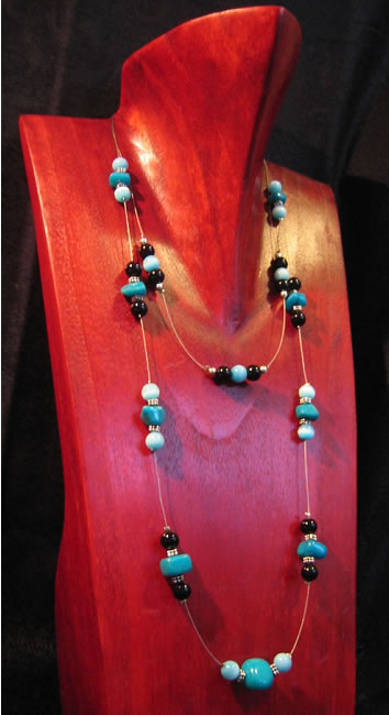 Wooden bust necklace holders made in Indonesia